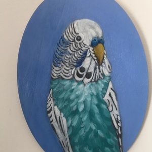4 3/4”x6 3/4”Wood oval w/ painting of parakeet